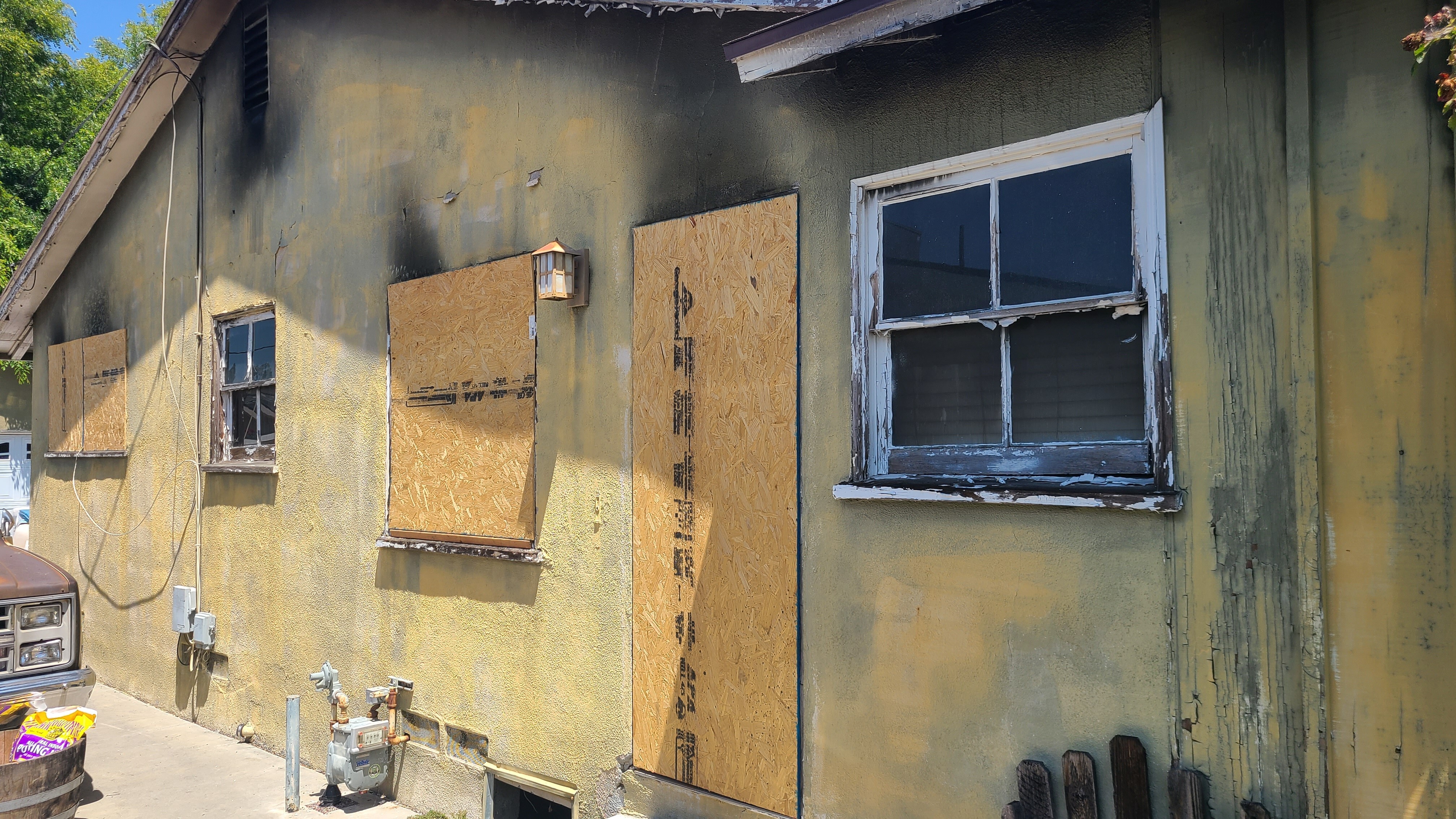 Residential single-family home after fire damage - Before