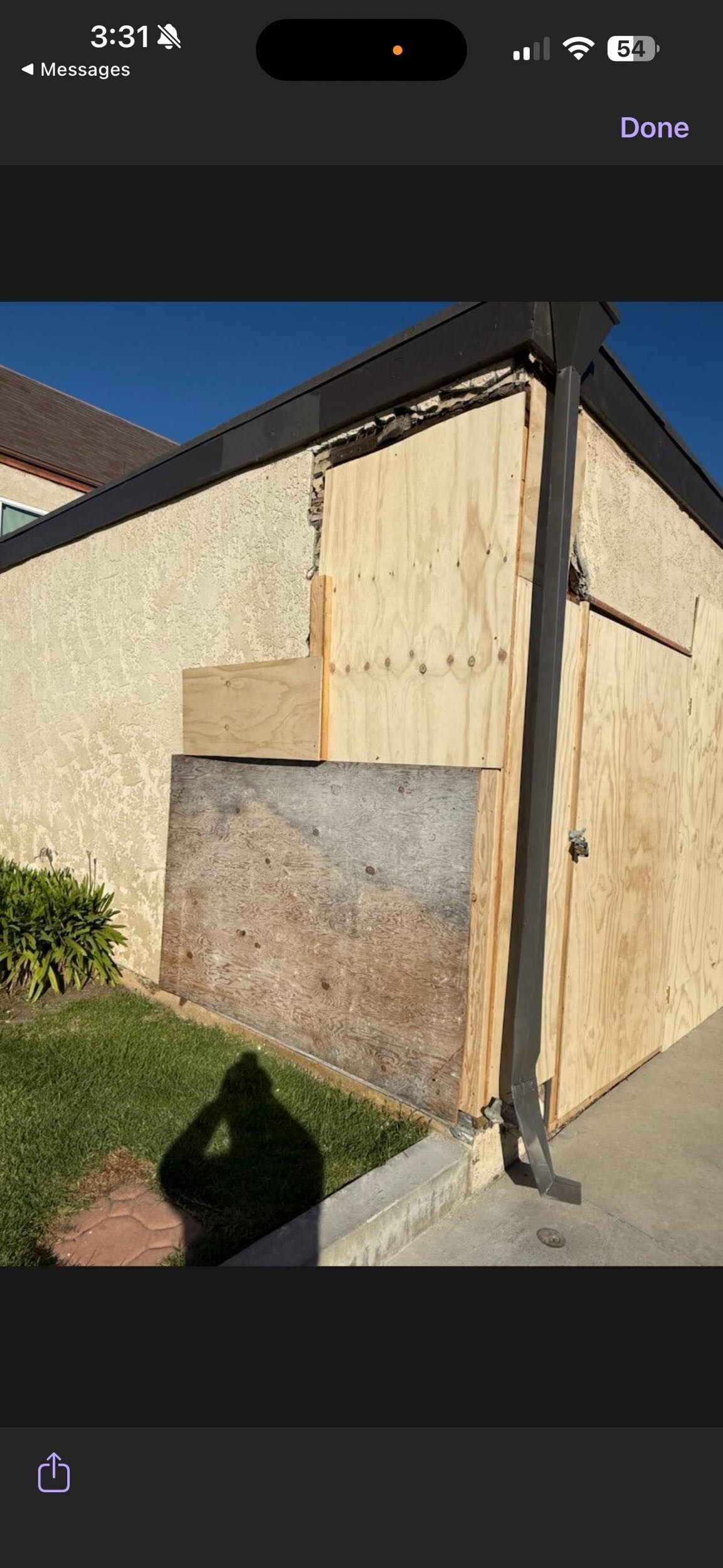 Detached garage reconstruction after vehicle impact - Before