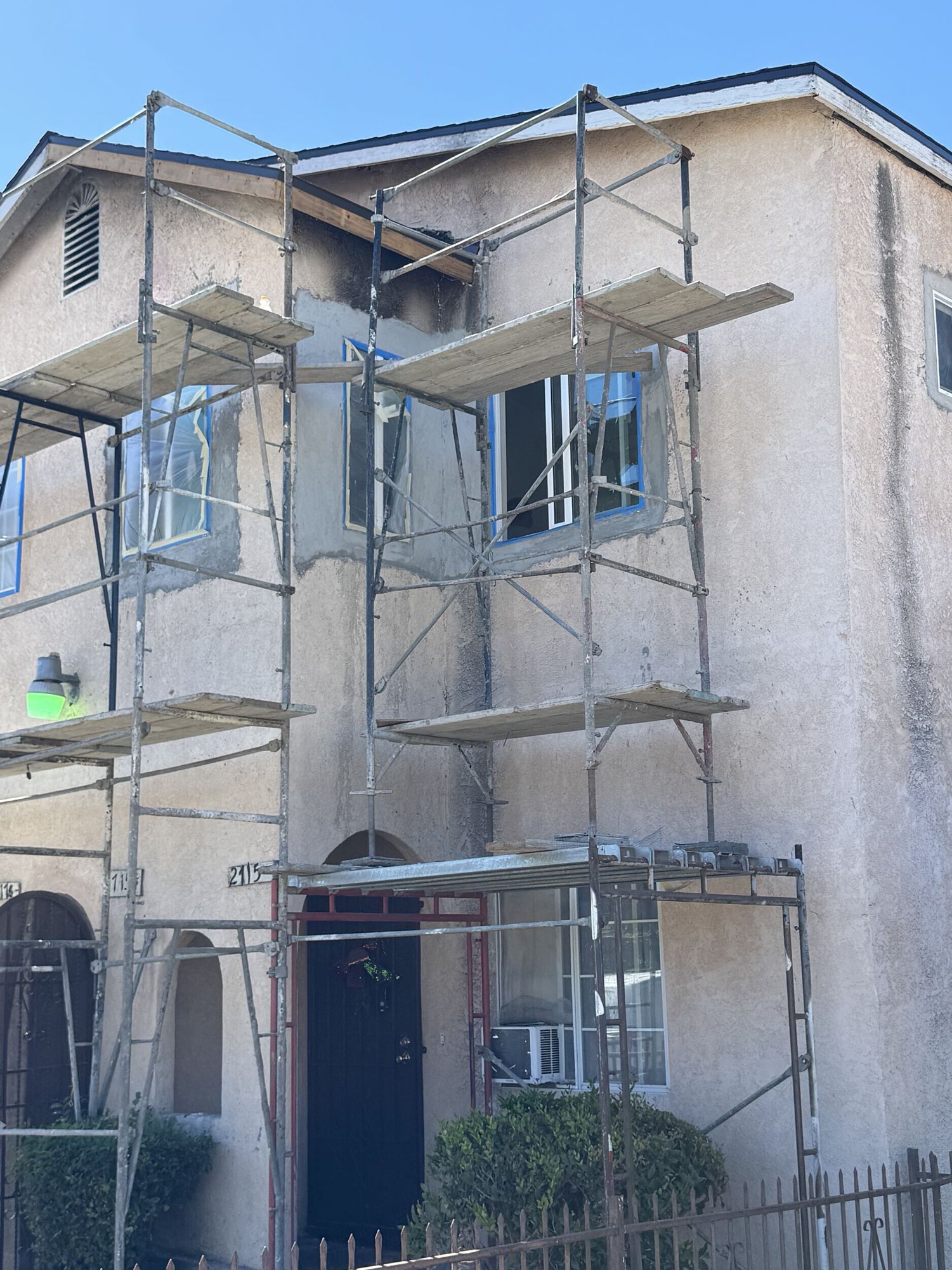 4 plex  Reconstruction following fire in apartment unit - During Construction