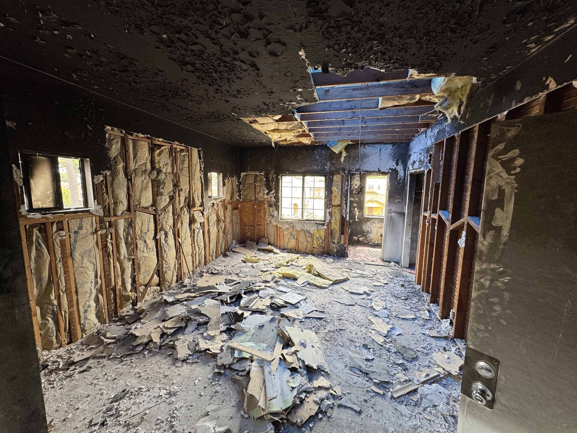 4 plex  Reconstruction following fire in apartment unit - During Construction