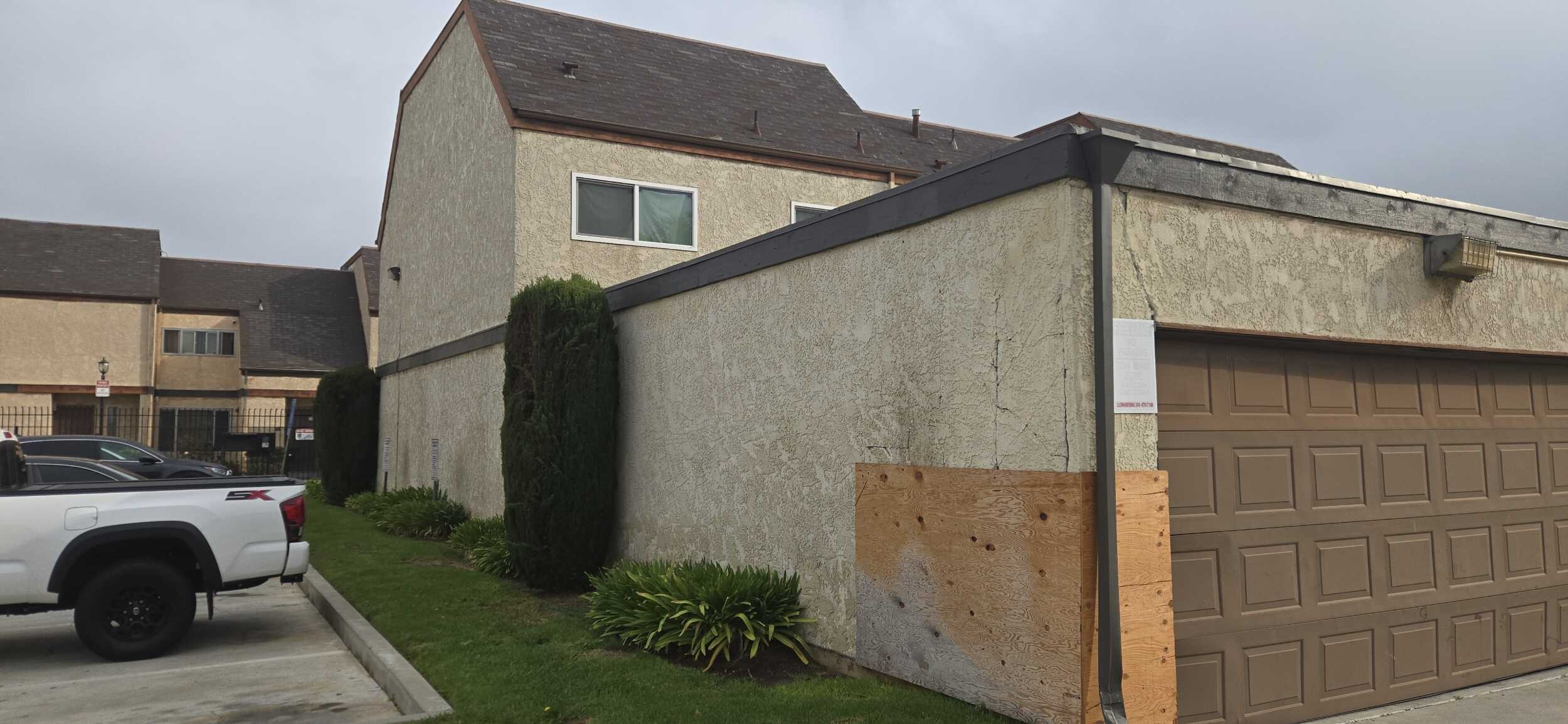 Detached garage reconstruction after vehicle impact - Before