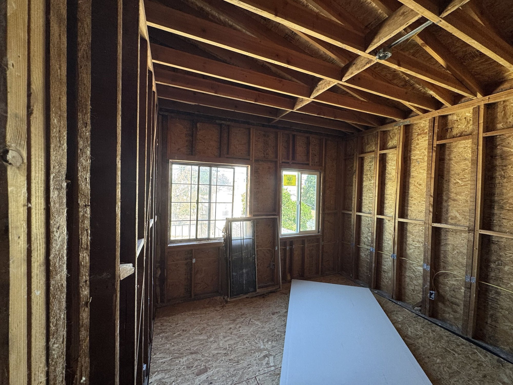 4 plex  Reconstruction following fire in apartment unit - During Construction