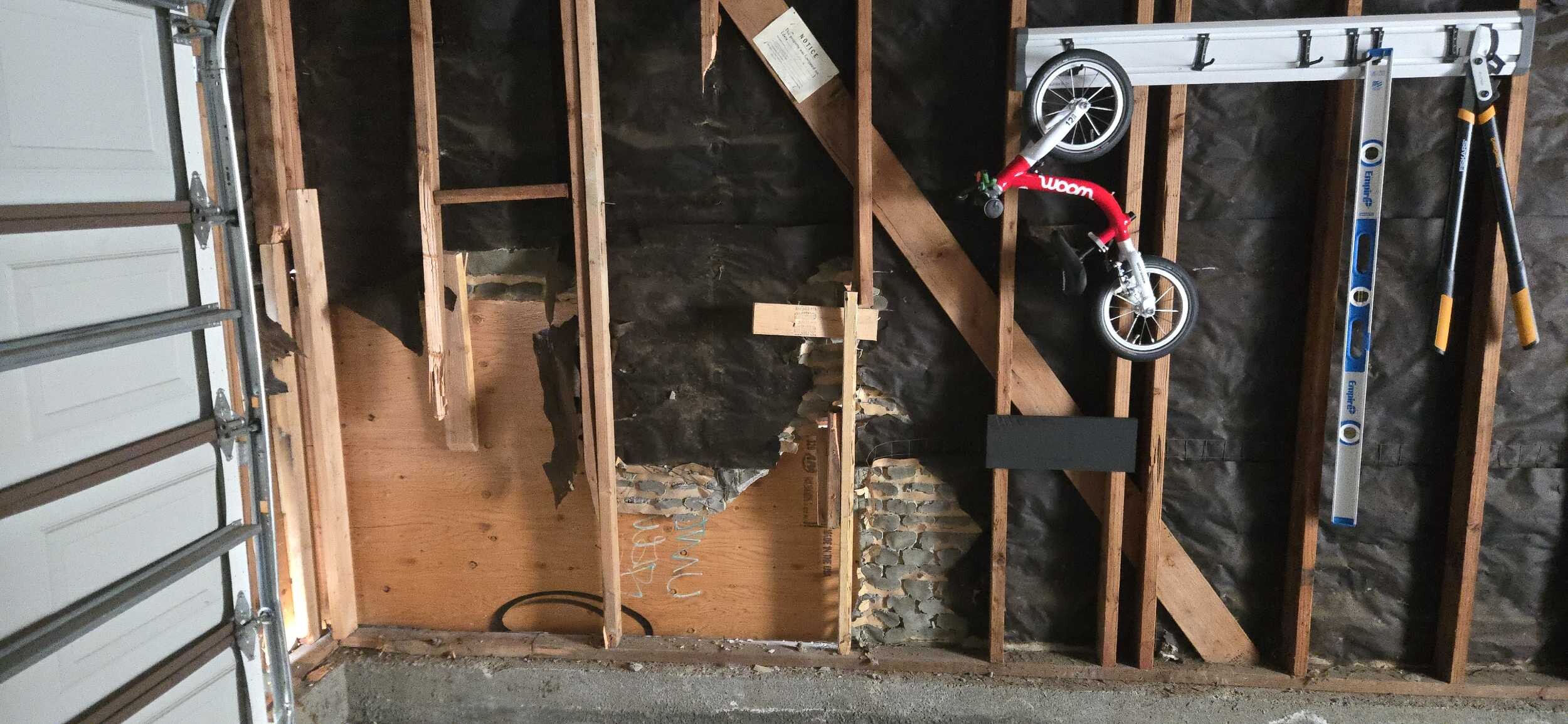 Detached garage reconstruction after vehicle impact - Before