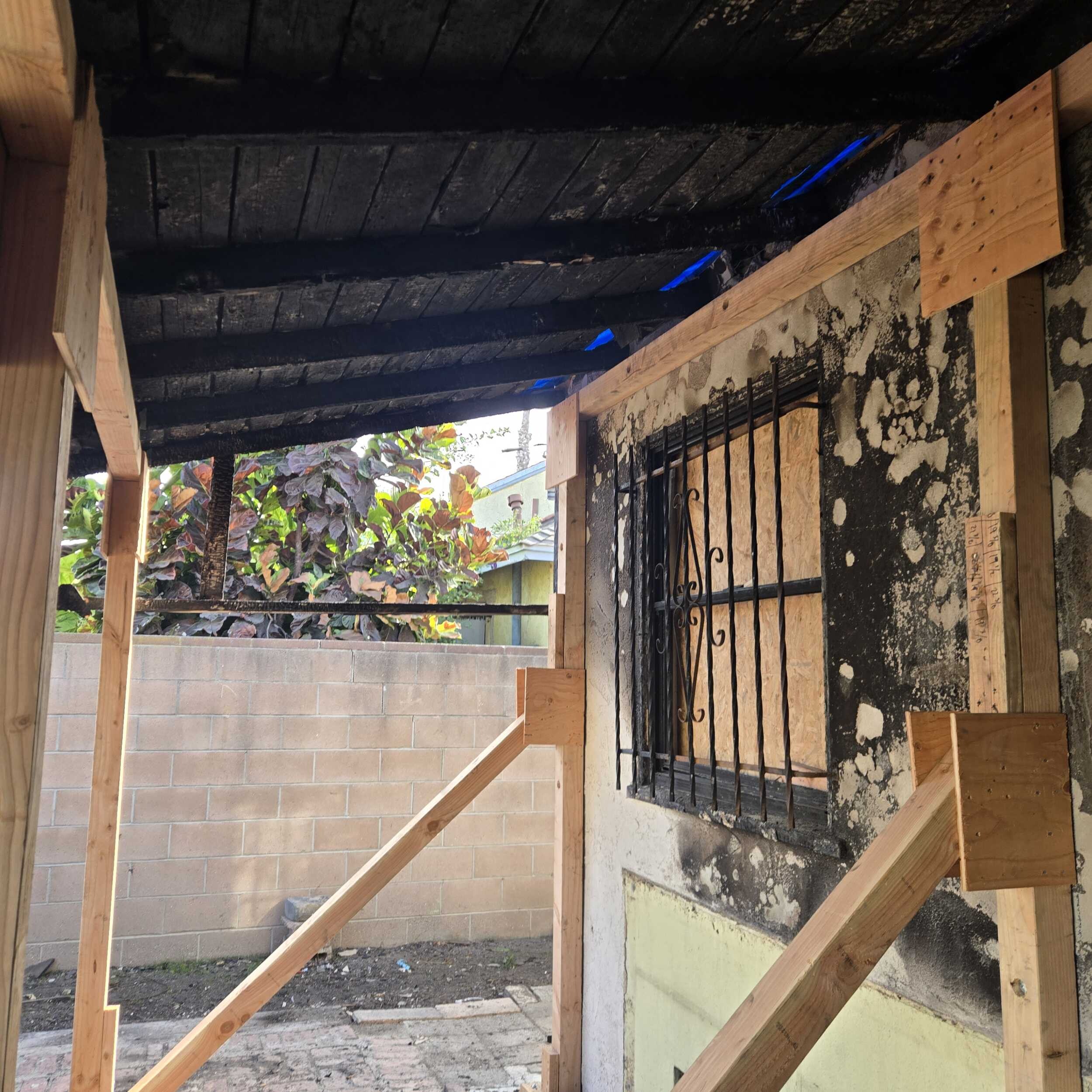 Residential single-family home after fire damage - Before