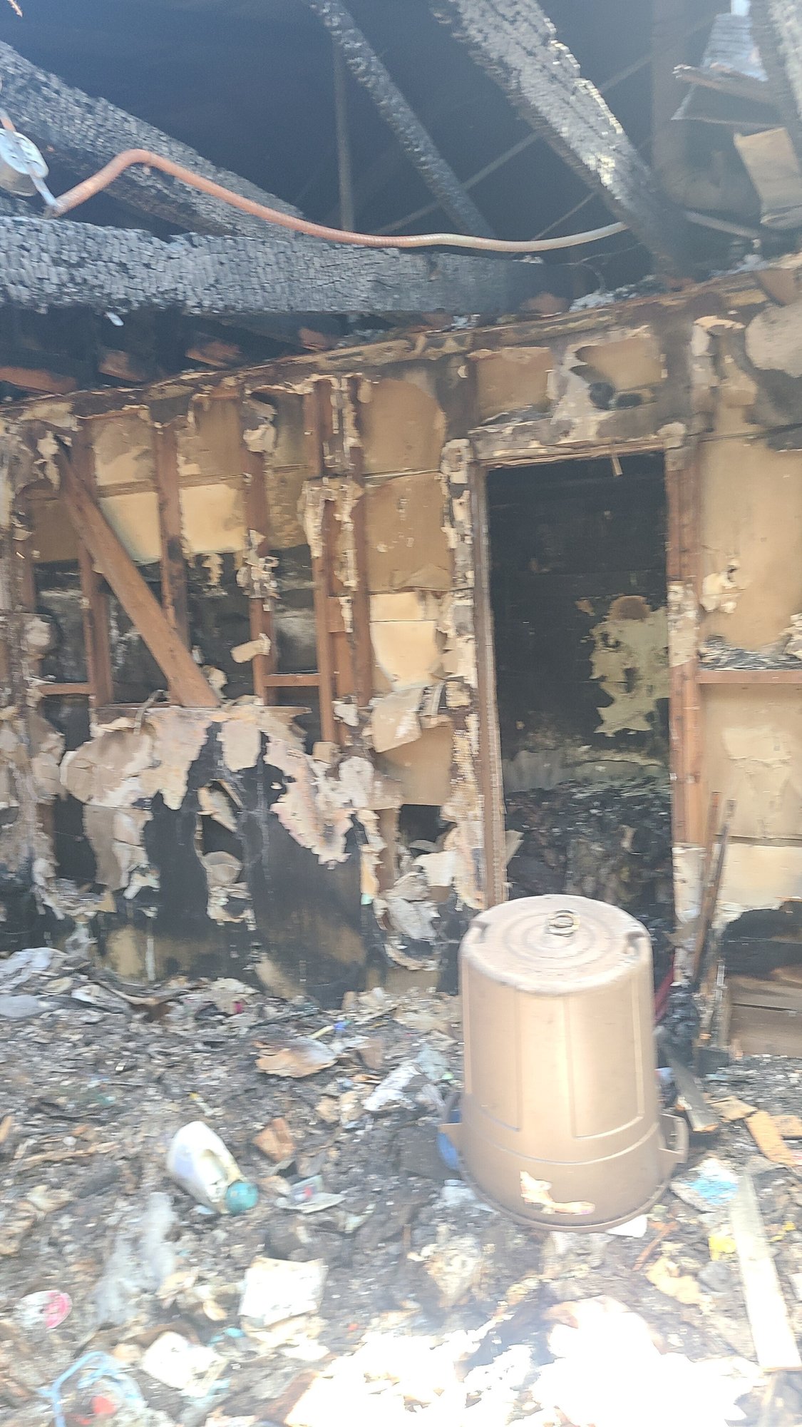 Residential single-family home after fire damage - Before